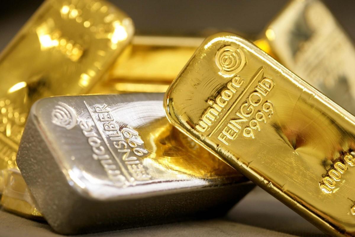 Qızılın qiyməti yenidən 5 000 dolları ötüb