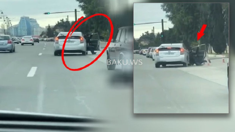 Sərnişin özünü hərəkətdə olan “Prius”dan yola atdı (VİDEO)